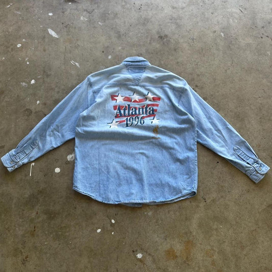 Vintage 90s Atlanta 1996 Olympics denim button up shirt very cool denim embroidery on front and big back graphic Light blue denim