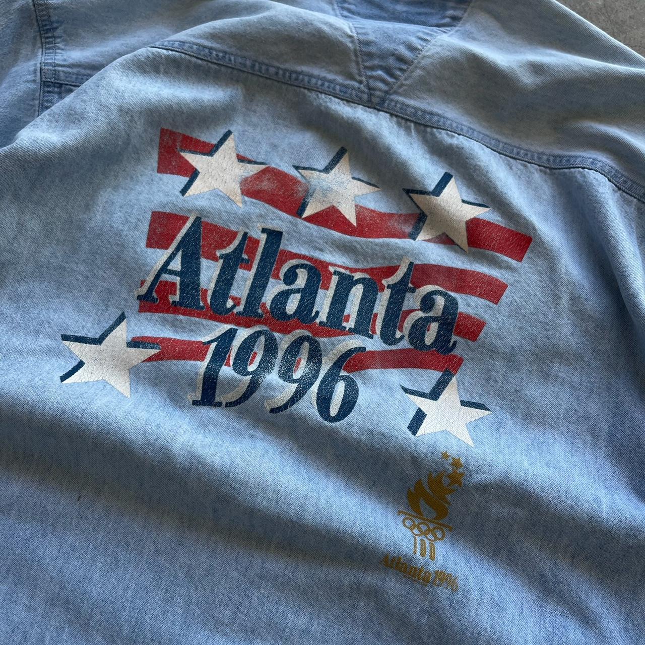 Vintage 90s Atlanta 1996 Olympics denim button up shirt very cool denim embroidery on front and big back graphic Light blue denim