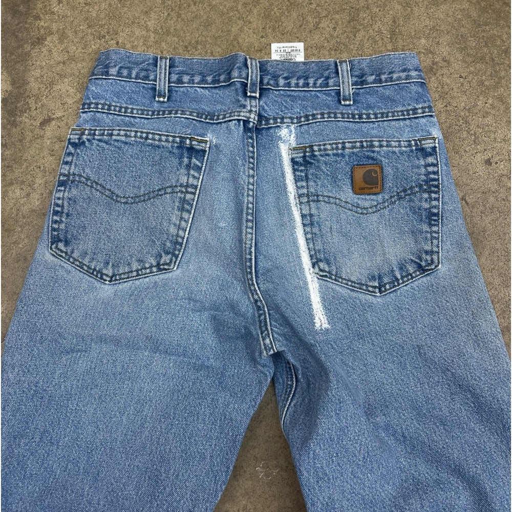 Men’s vintage faded blue Carhartt denim pants size 32x34 (repaired)