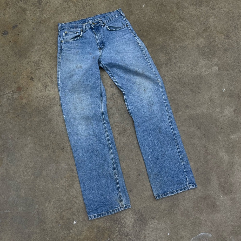 Men’s vintage faded blue Carhartt denim pants size 32x34 (repaired)